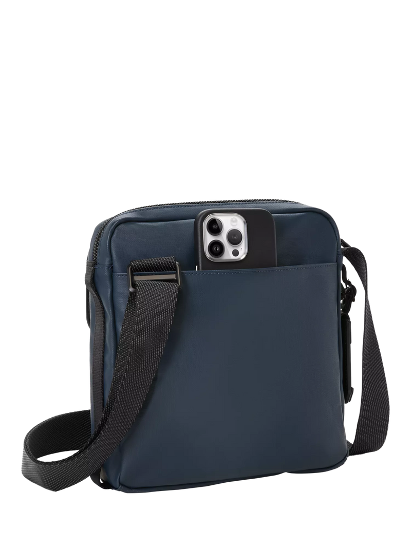 TUMI Junior crossbody bag navy coated canvas, UK version