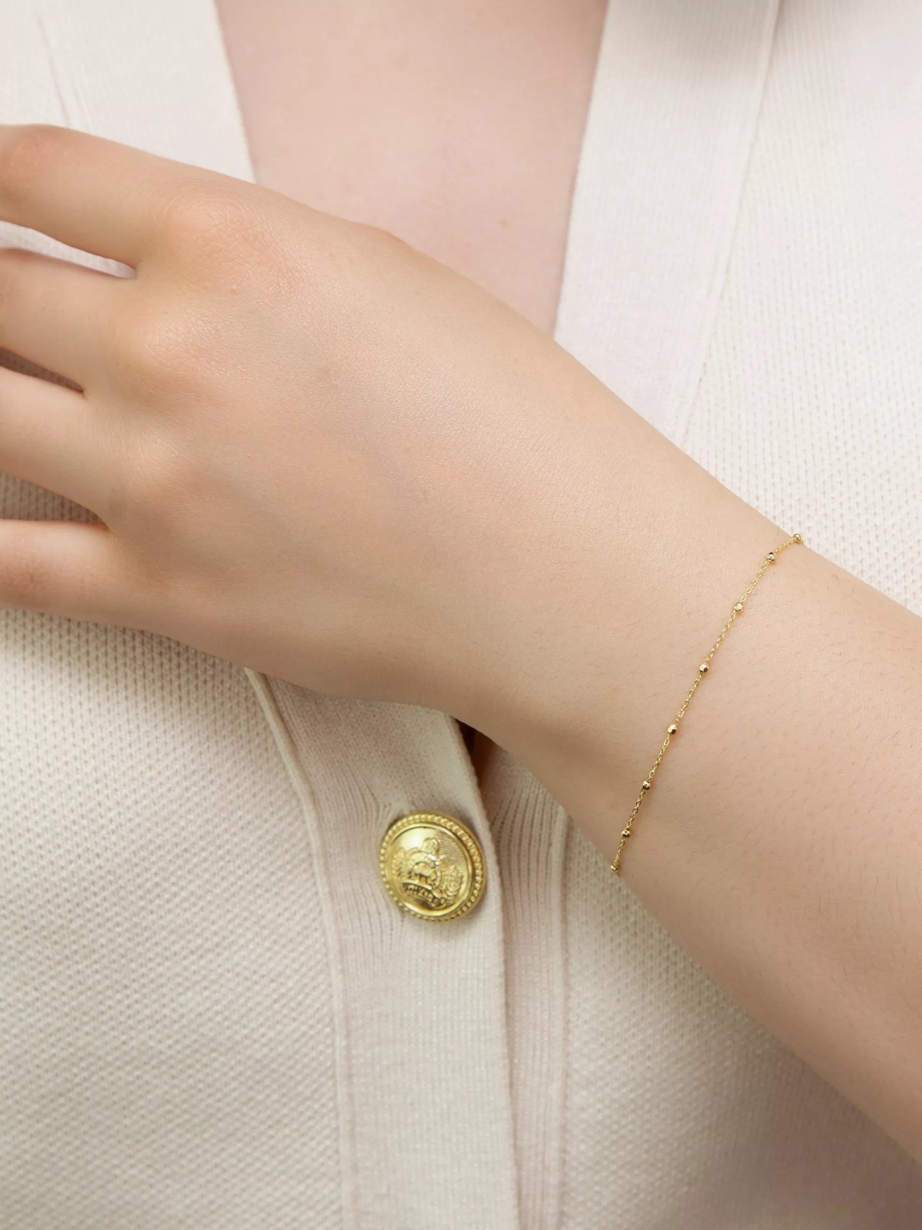 IBB 9ct yellow gold diamond cut ball trace bracelet, UK version