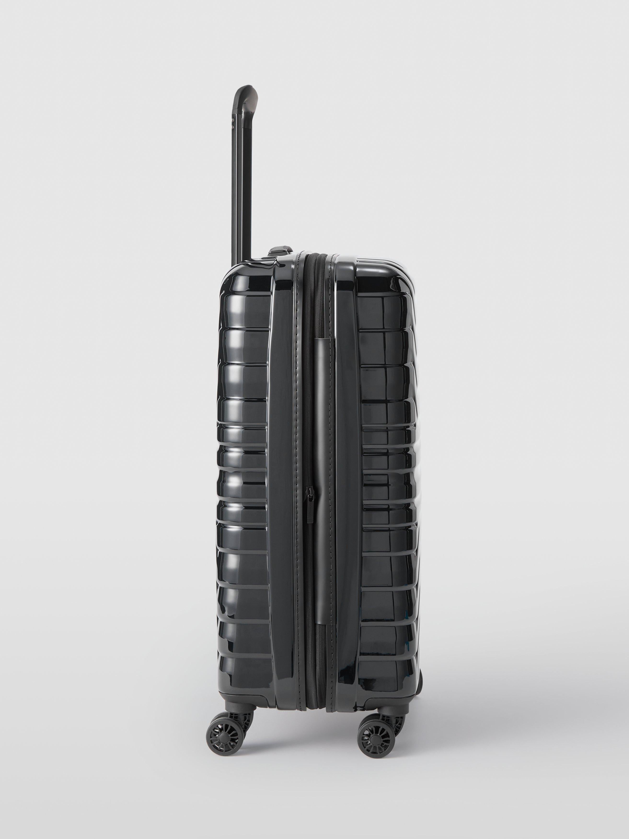 John Lewis Tulum 8-wheel 67cm hard shell medium suitcase, UK version