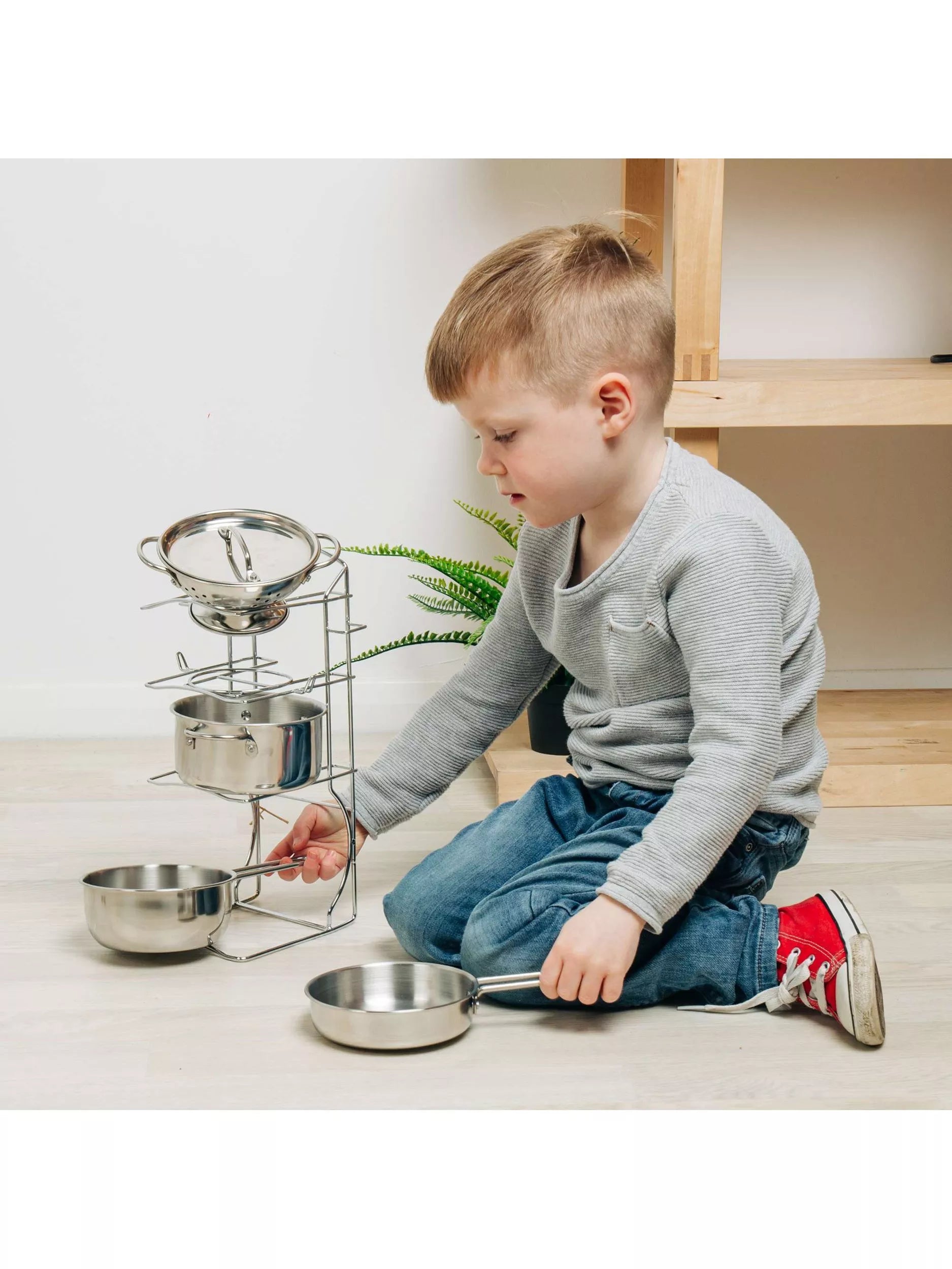Bigjigs Toys cooking pot rack with pots and utensils (British brand)