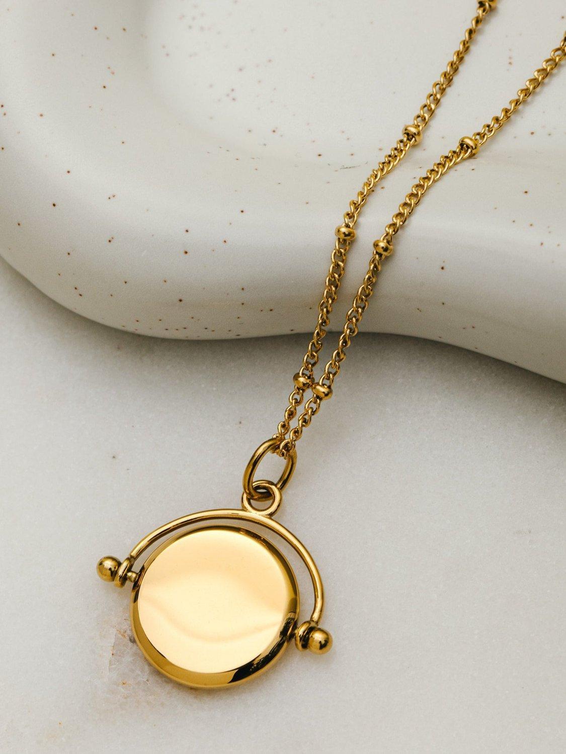 Orelia Faceted Disc Spinner Necklace pale gold 45.5cm (British brand)