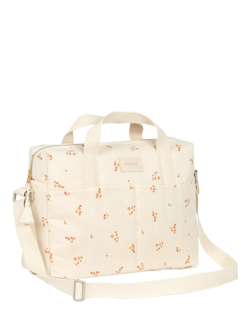 Nobodinoz Gala changing bag yellow lily organic cotton, UK version