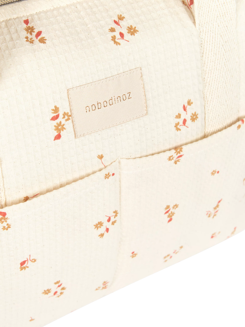 Nobodinoz Gala changing bag yellow lily organic cotton, UK version