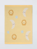 John Lewis knitted blanket yellow for Moses basket, UK version