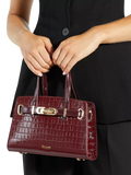 Dune London burgundy leather grab bag with belted detail, imported from the UK