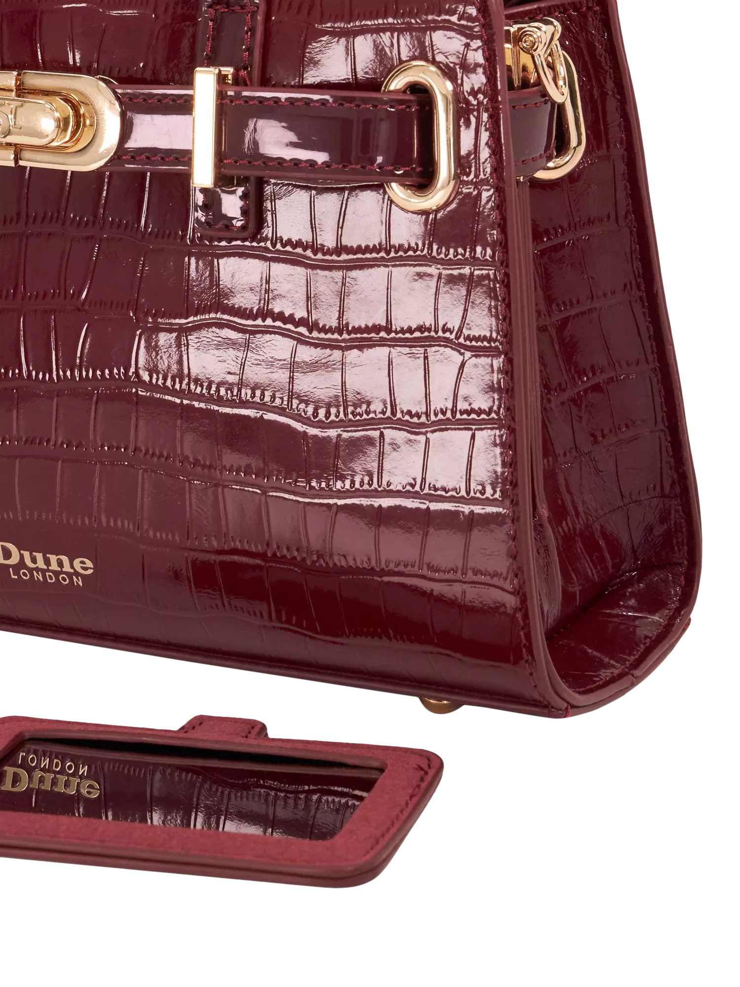 Dune London burgundy leather grab bag with belted detail, imported from the UK