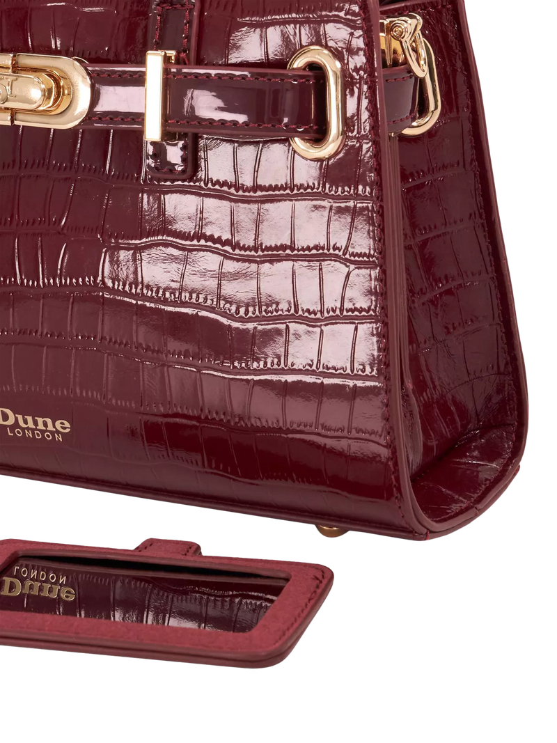 Dune London burgundy leather grab bag with belted detail, imported from the UK
