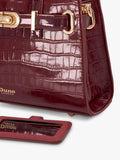 Dune London burgundy leather grab bag with belted detail, imported from the UK