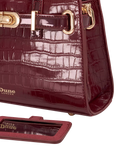 Dune London burgundy leather grab bag with belted detail, imported from the UK