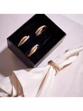 L'OBJET gold and platinum brass napkin rings set of 4 (British brand)