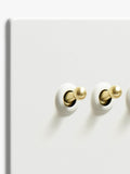 Dowsing & Reynolds soft white quadruple toggle switch, imported from the UK