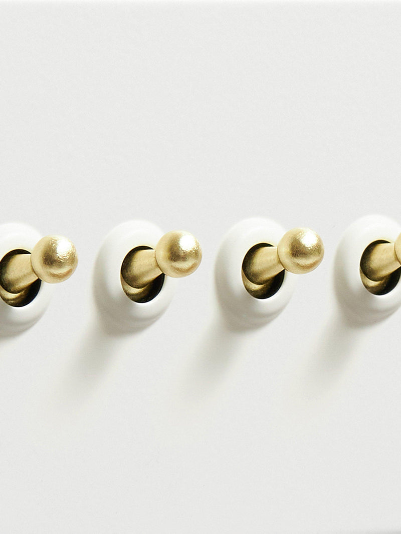 Dowsing & Reynolds soft white quadruple toggle switch, imported from the UK