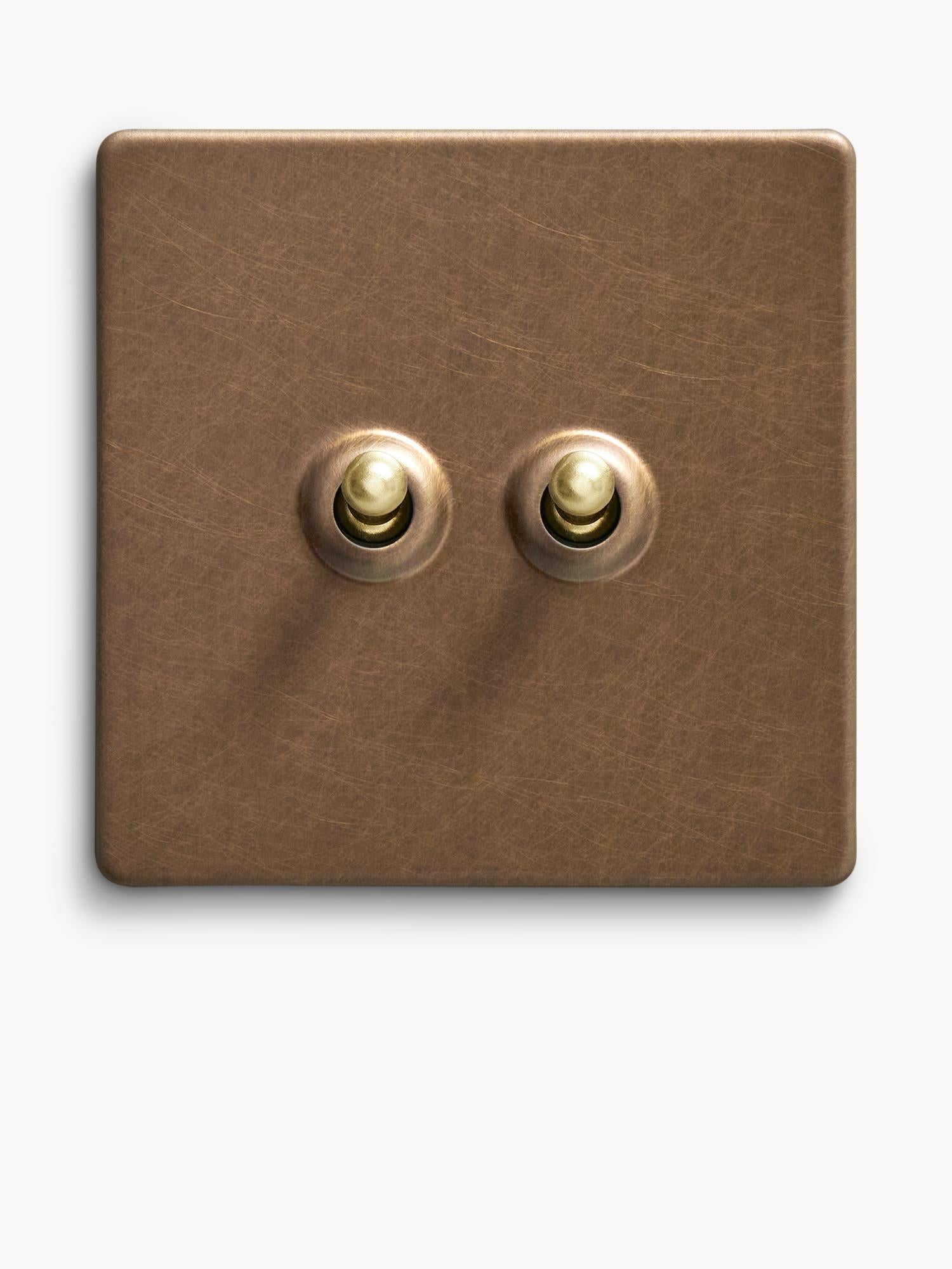 Dowsing & Reynolds antique brass double toggle switch, UK version