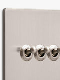 Dowsing & Reynolds silver triple toggle light switch, imported from the UK
