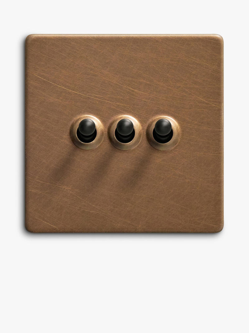 Dowsing & Reynolds antique brass triple toggle switch (British brand)