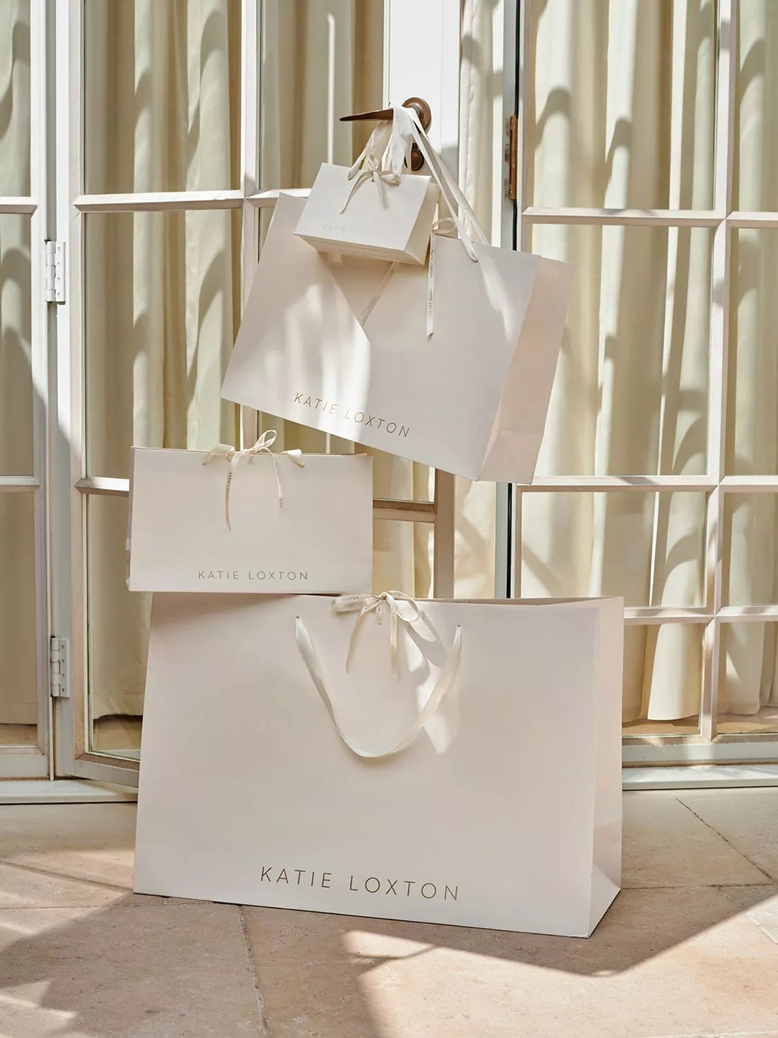 Katie Loxton Milan cabin bag in light taupe - British product