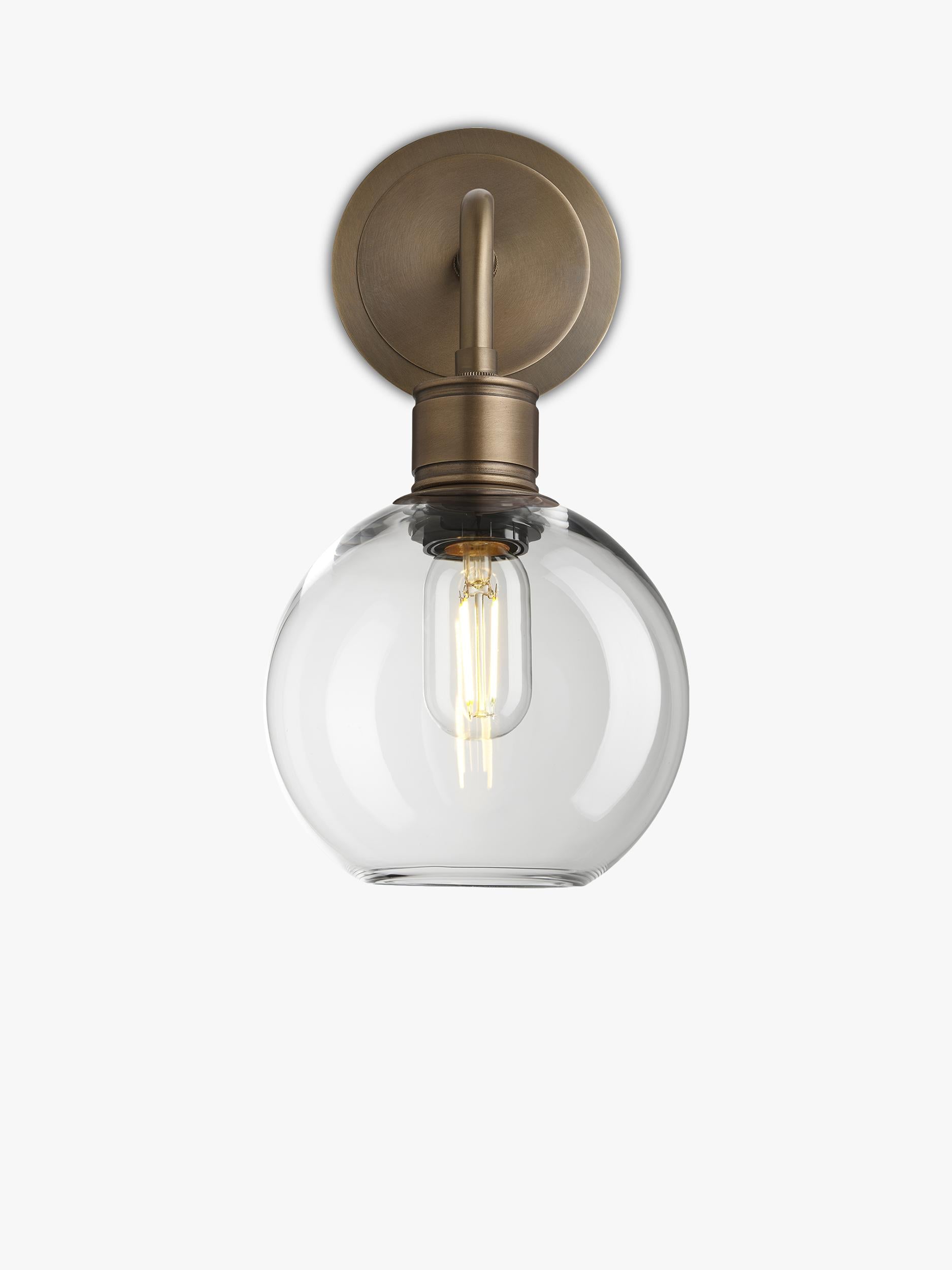 Industville clear glass globe wall light antique brass (British brand)