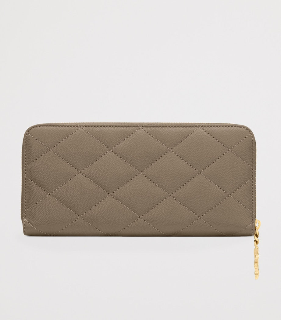 Saint Laurent Matelassé zip-up wallet with YSL monogram (British brand)