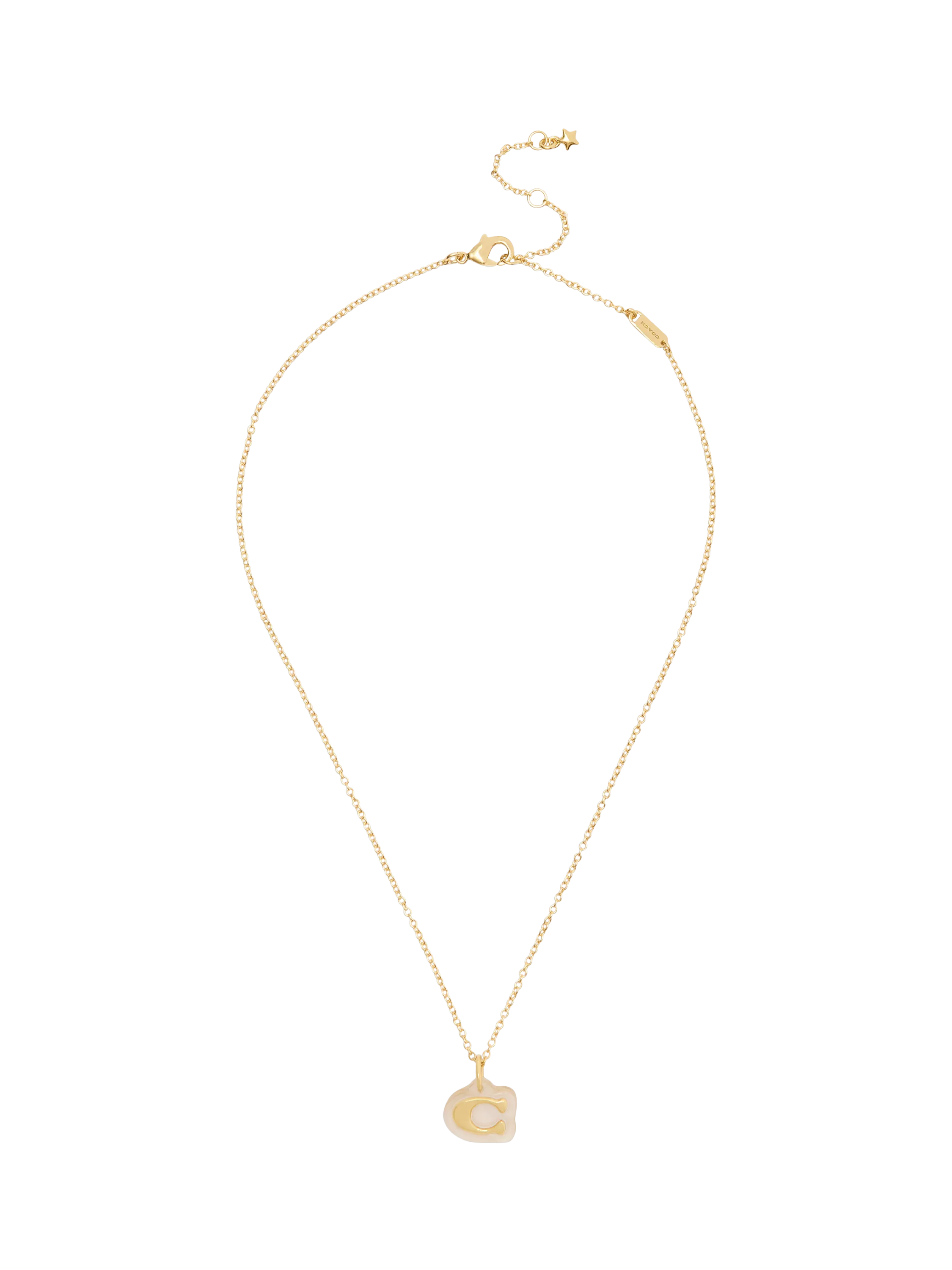 Coach gold pendant necklace with lucite and cubic zirconia, imported from the UK