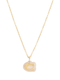 Coach gold pendant necklace with lucite and cubic zirconia, imported from the UK