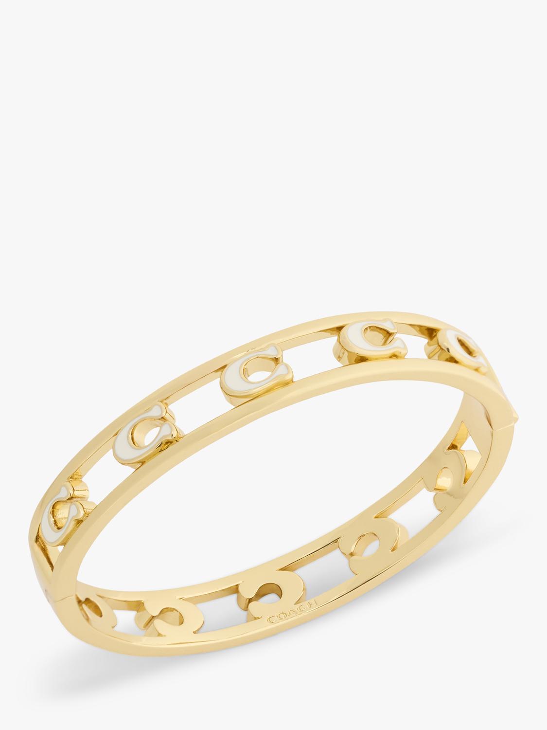 Coach bangle bracelet in chalk with gold toned metal and enamel, UK version