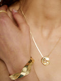 TUTTI gold plated open twist bangle - British product