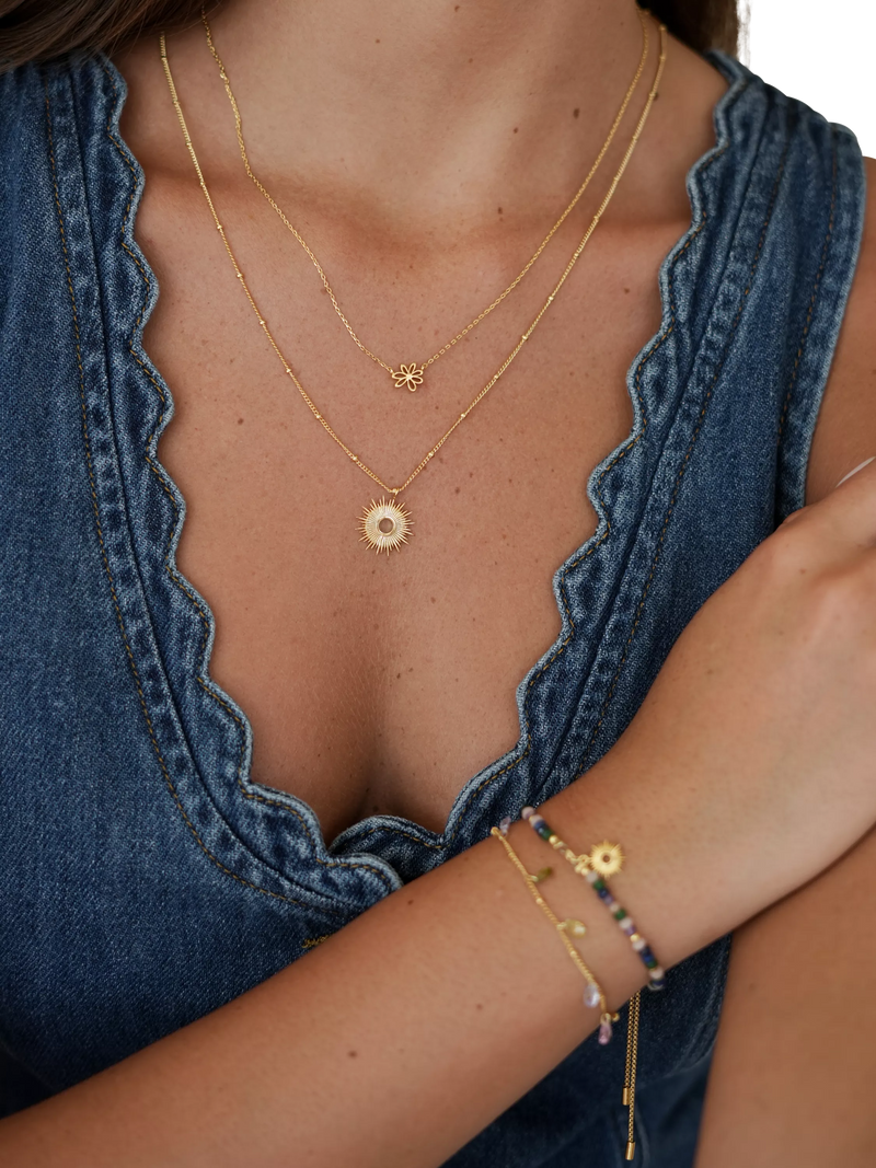Estella Bartlett gold necklace with doodle flower pendant - British product