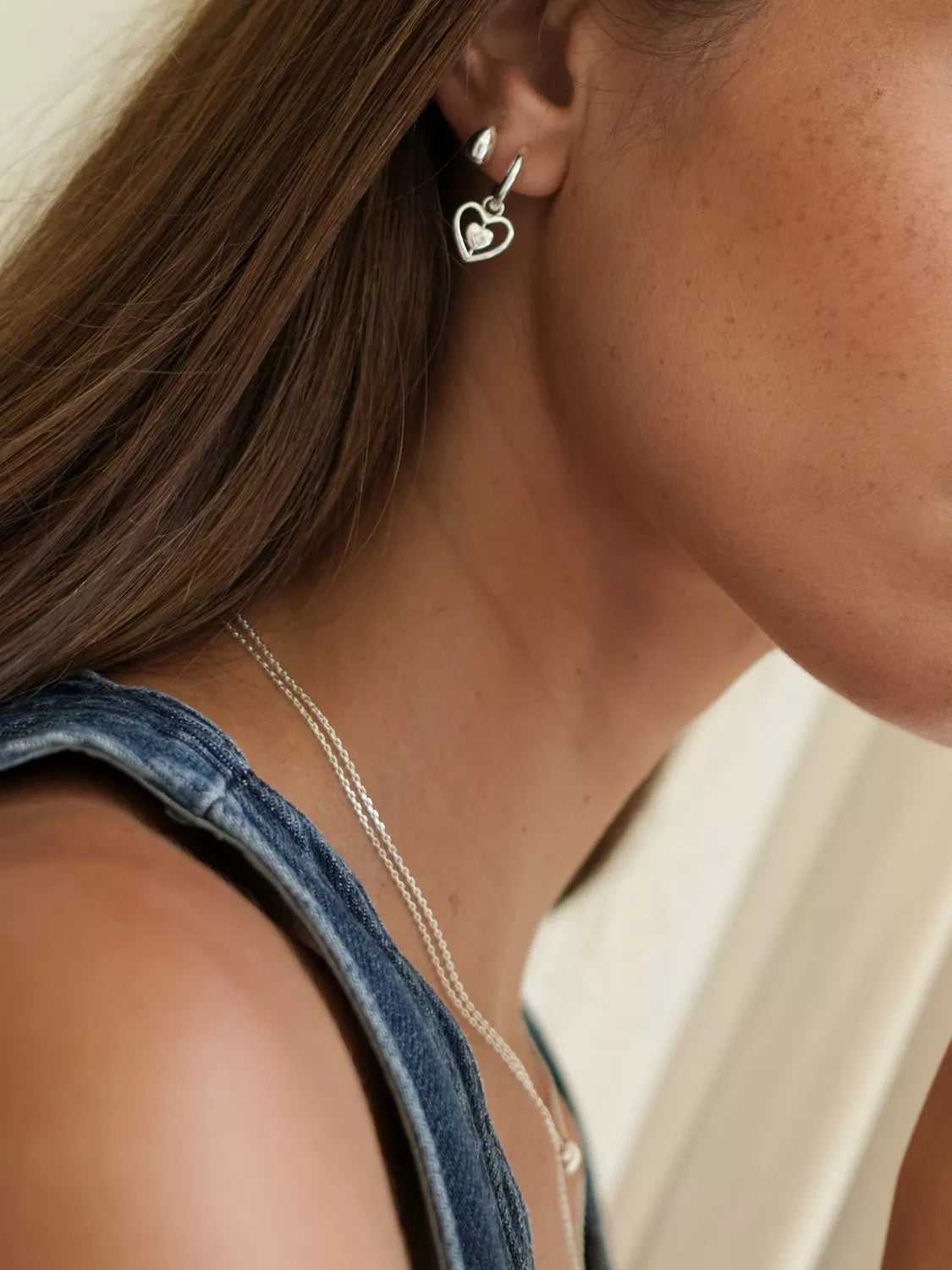 Estella Bartlett mini teardrop stud earrings in silver (British brand)