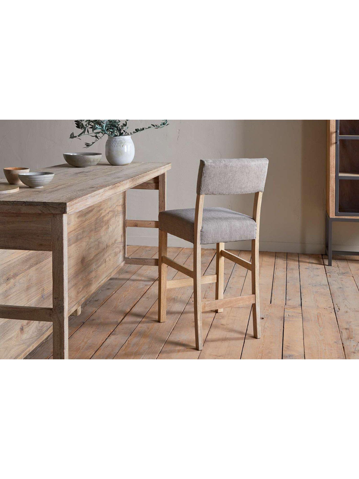 nkuku Nadeeka mango wood counter chair natural finish, imported from the UK