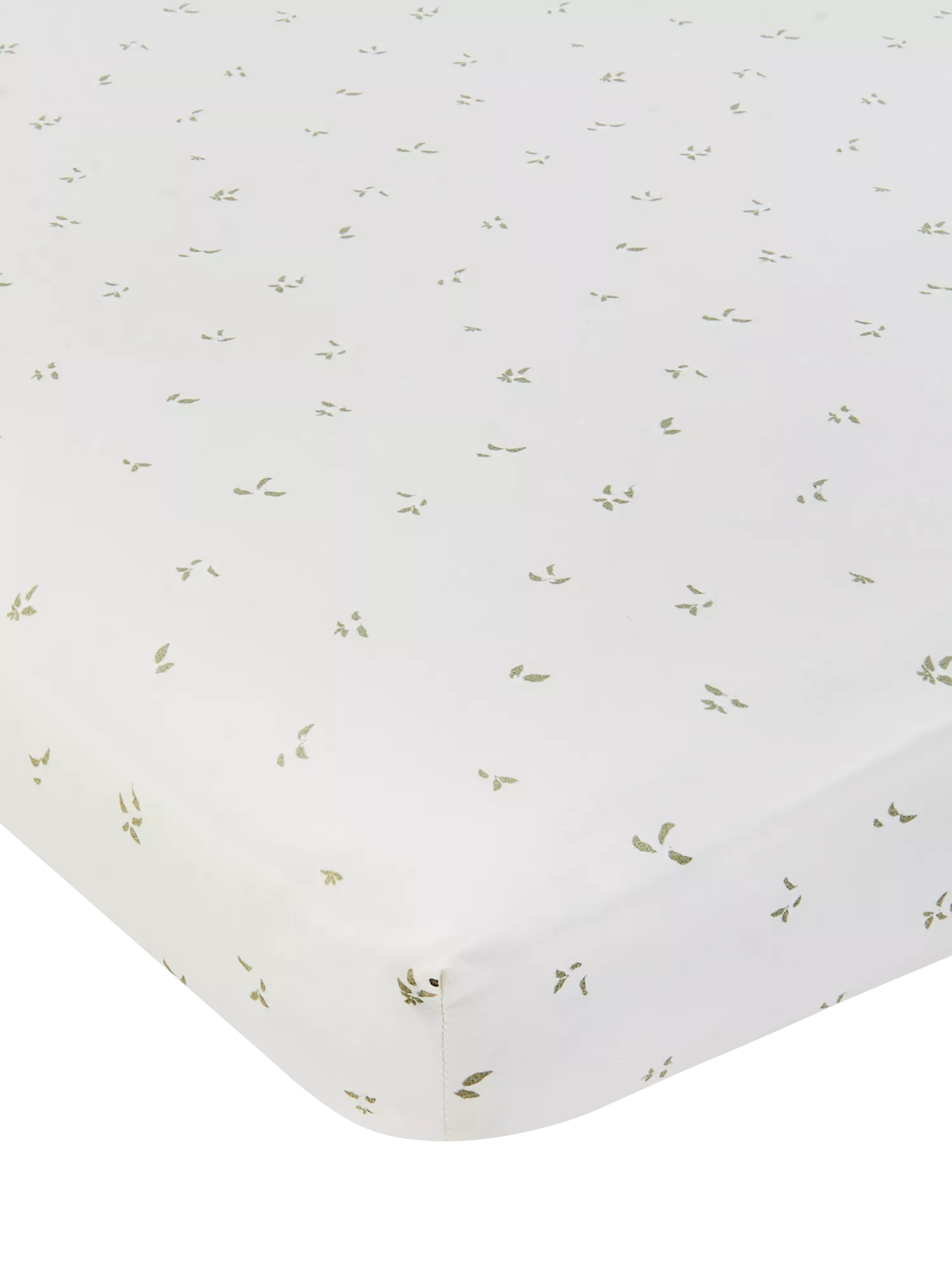 Avery Row cotbed fitted sheet nettle scatter pattern imported from the UK