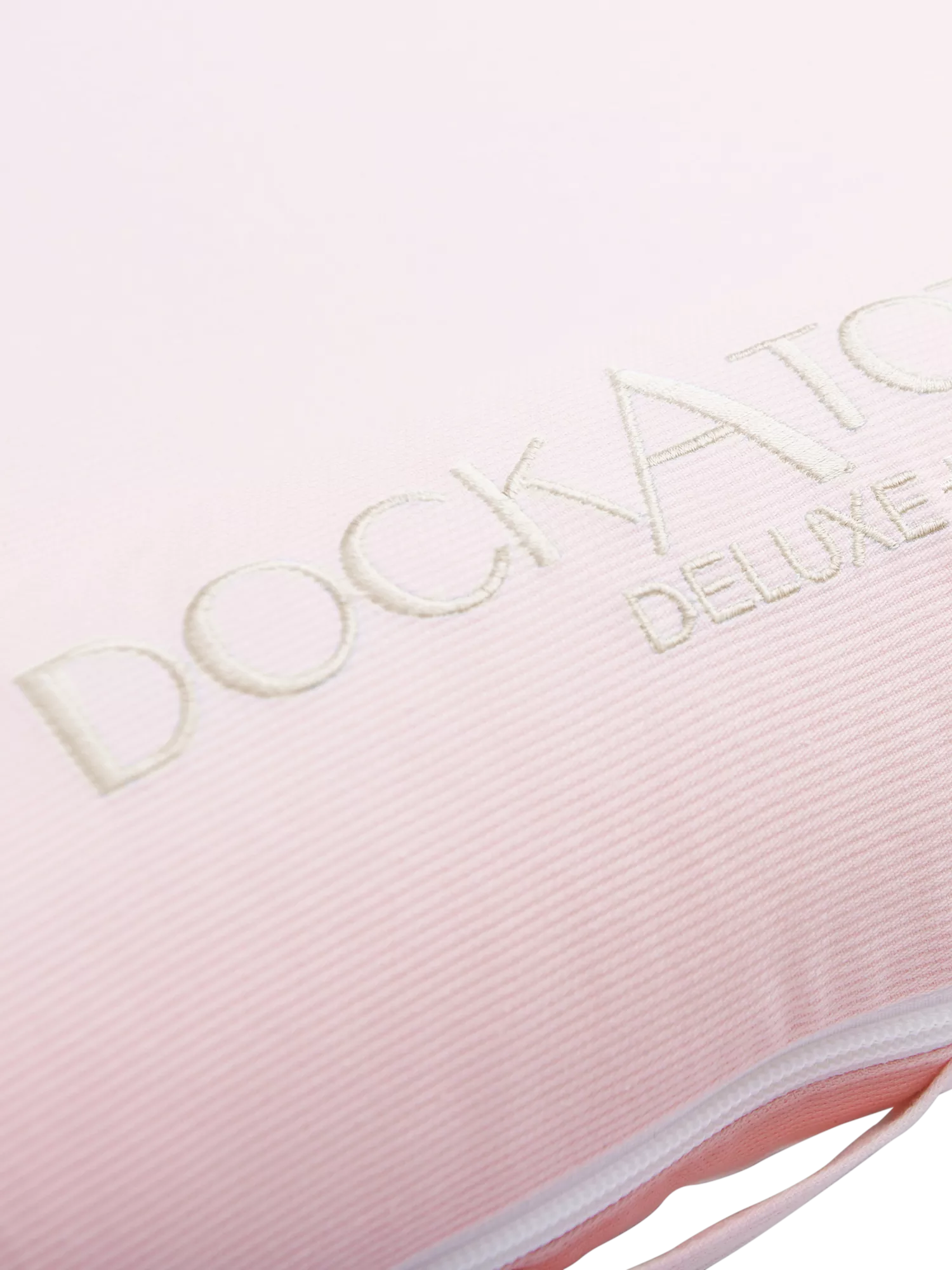 DockATot Deluxe+ pink baby pod - British product