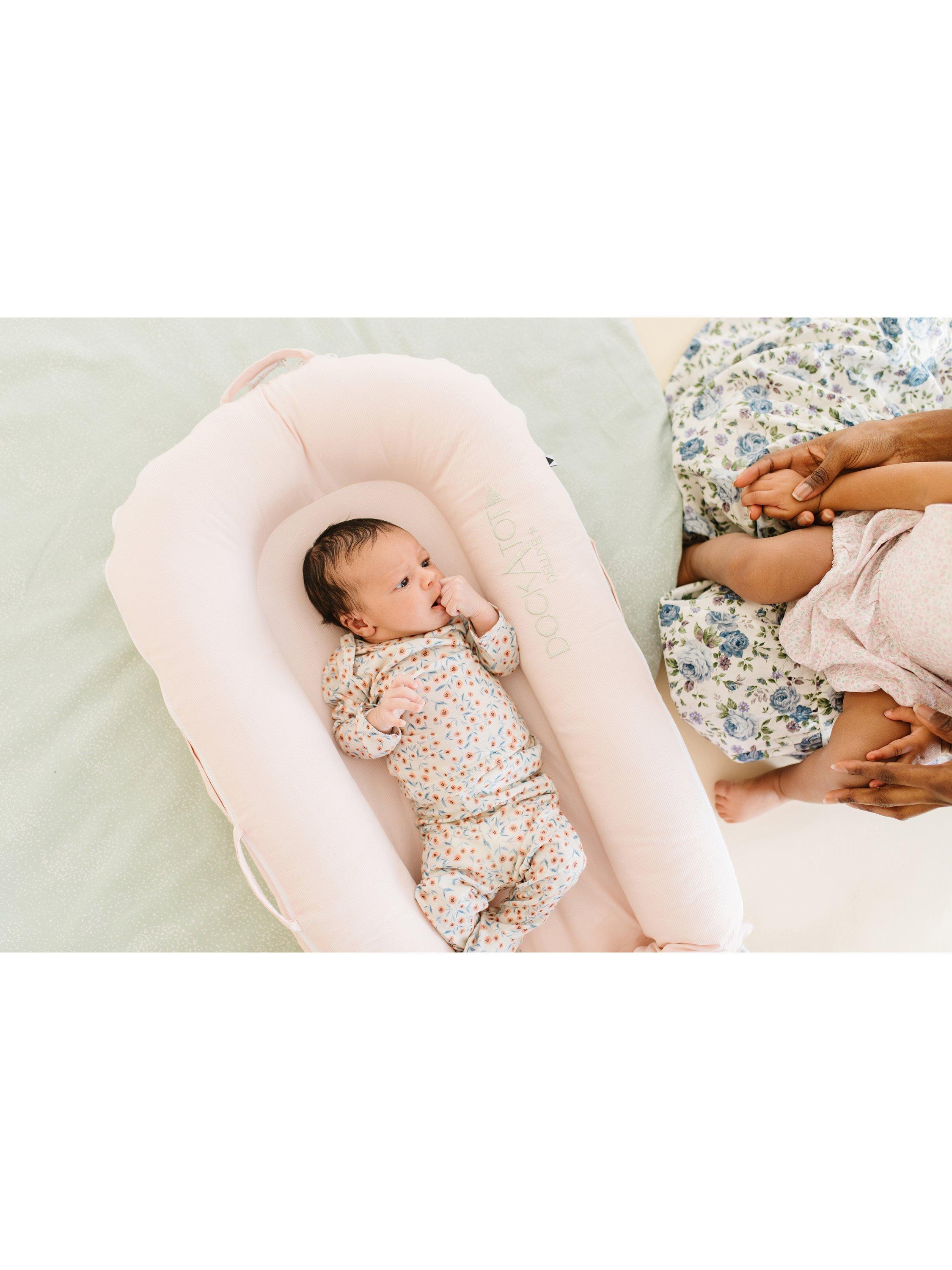 DockATot Deluxe+ pink baby pod - British product