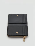 Mango diagonal quilted purse black small, imported from the UK