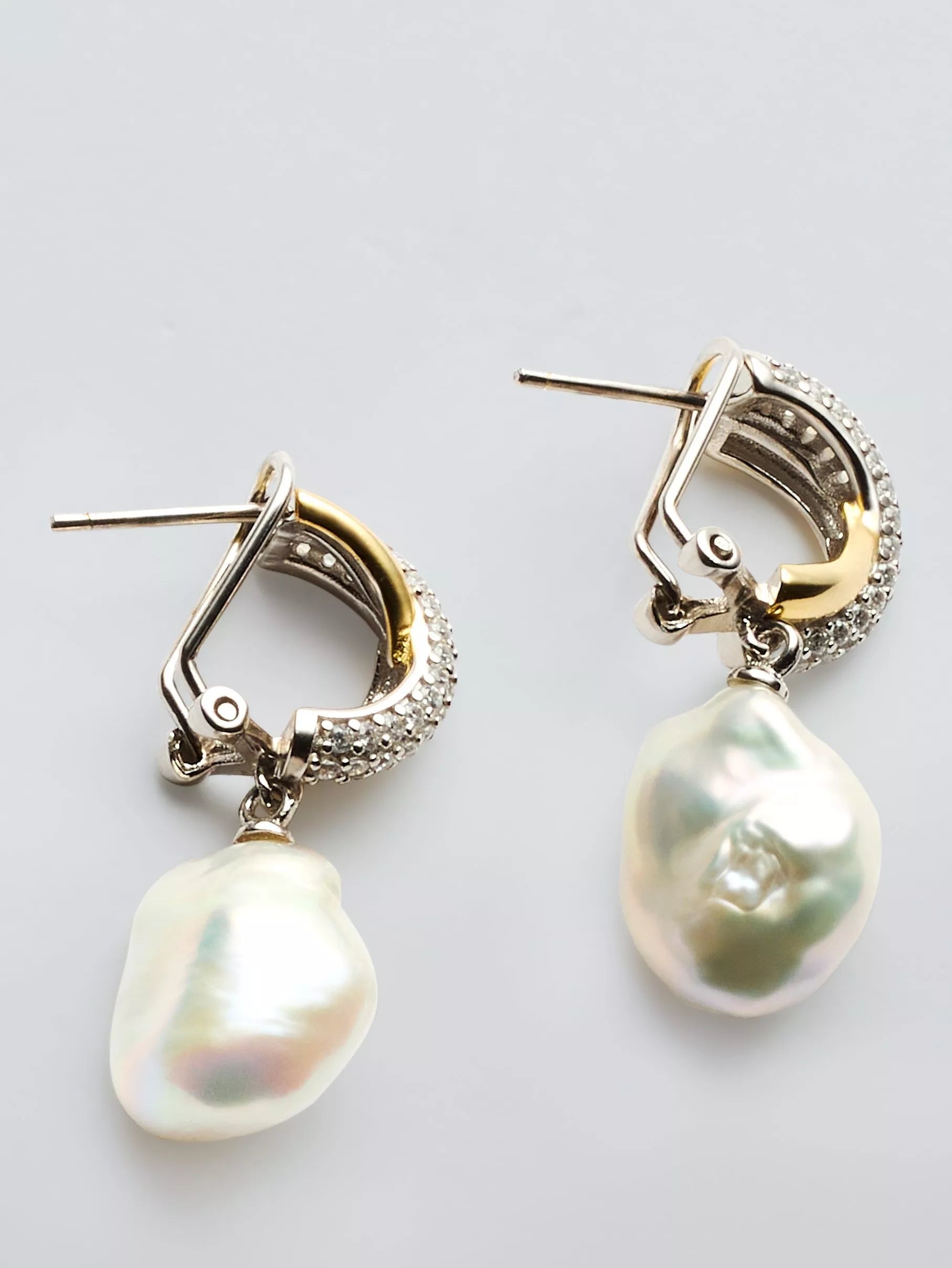 Lido cross over cubic zirconia pearl drop earrings, imported from the UK