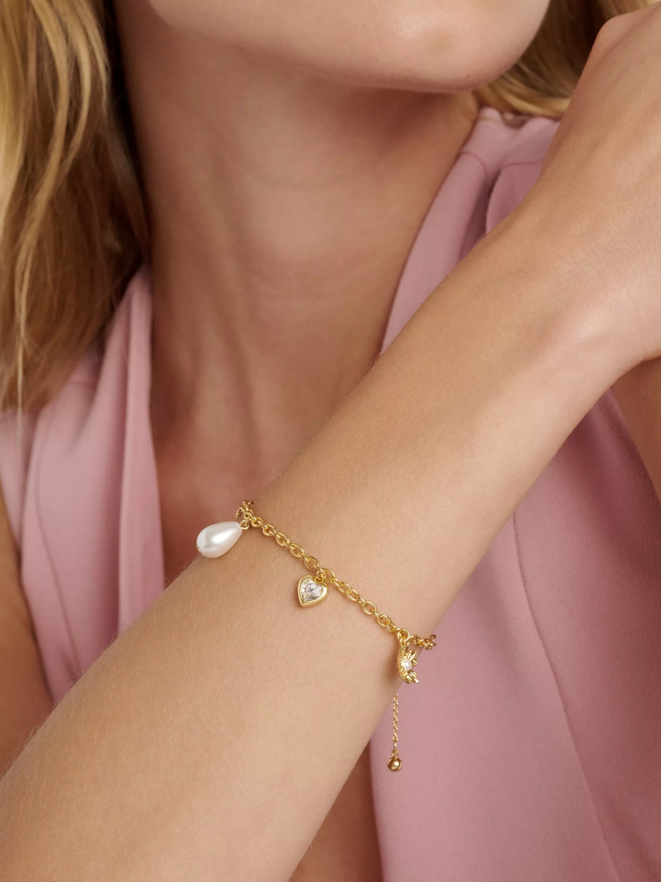 Ted Baker gold tone charm bracelet, imported from the UK