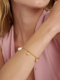 Ted Baker gold tone charm bracelet, imported from the UK