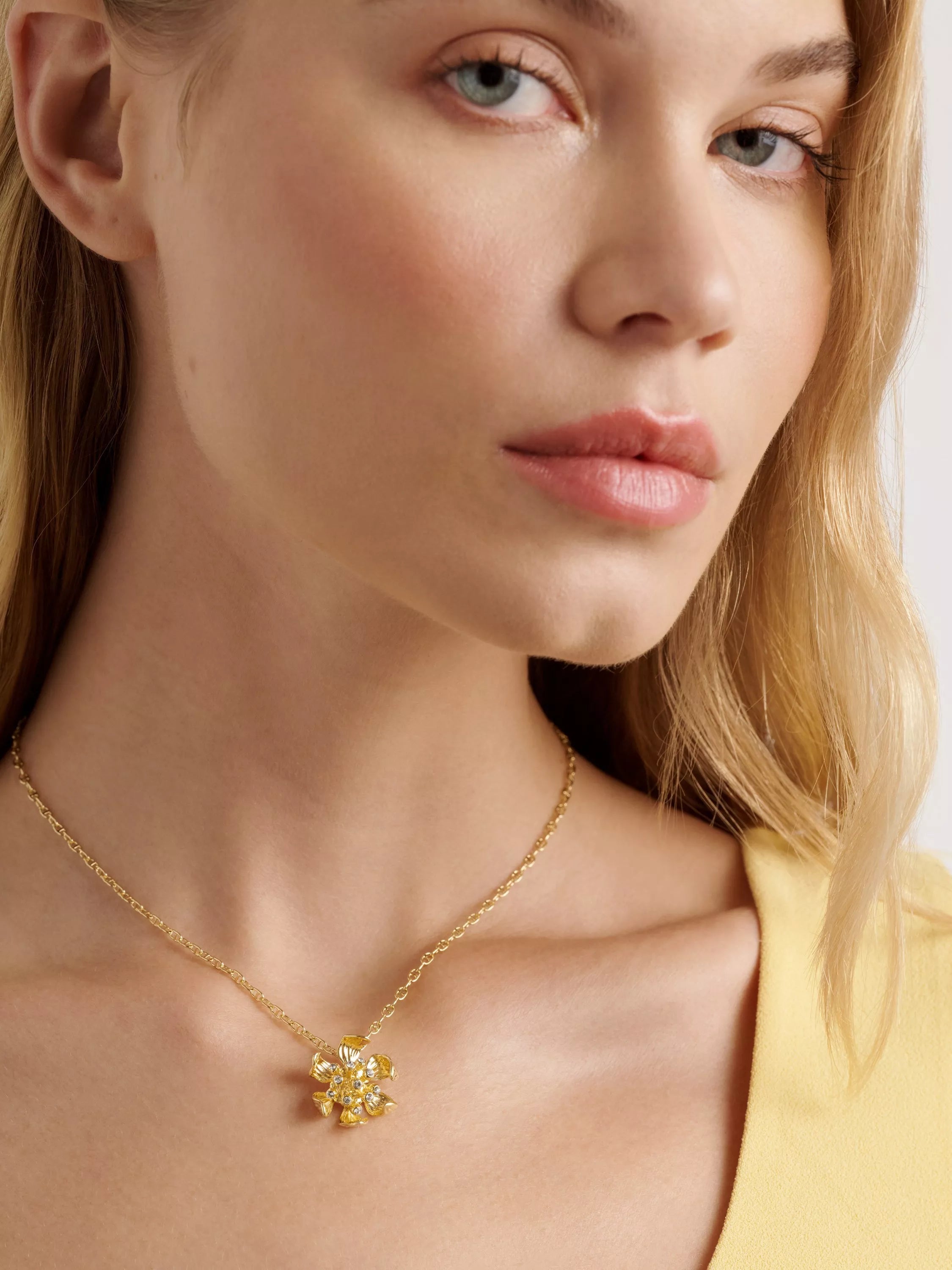 Ted Baker gold pendant necklace flower charm, imported from the UK