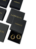 LARNAUTI cross hatch textured gold bangle, imported from the UK