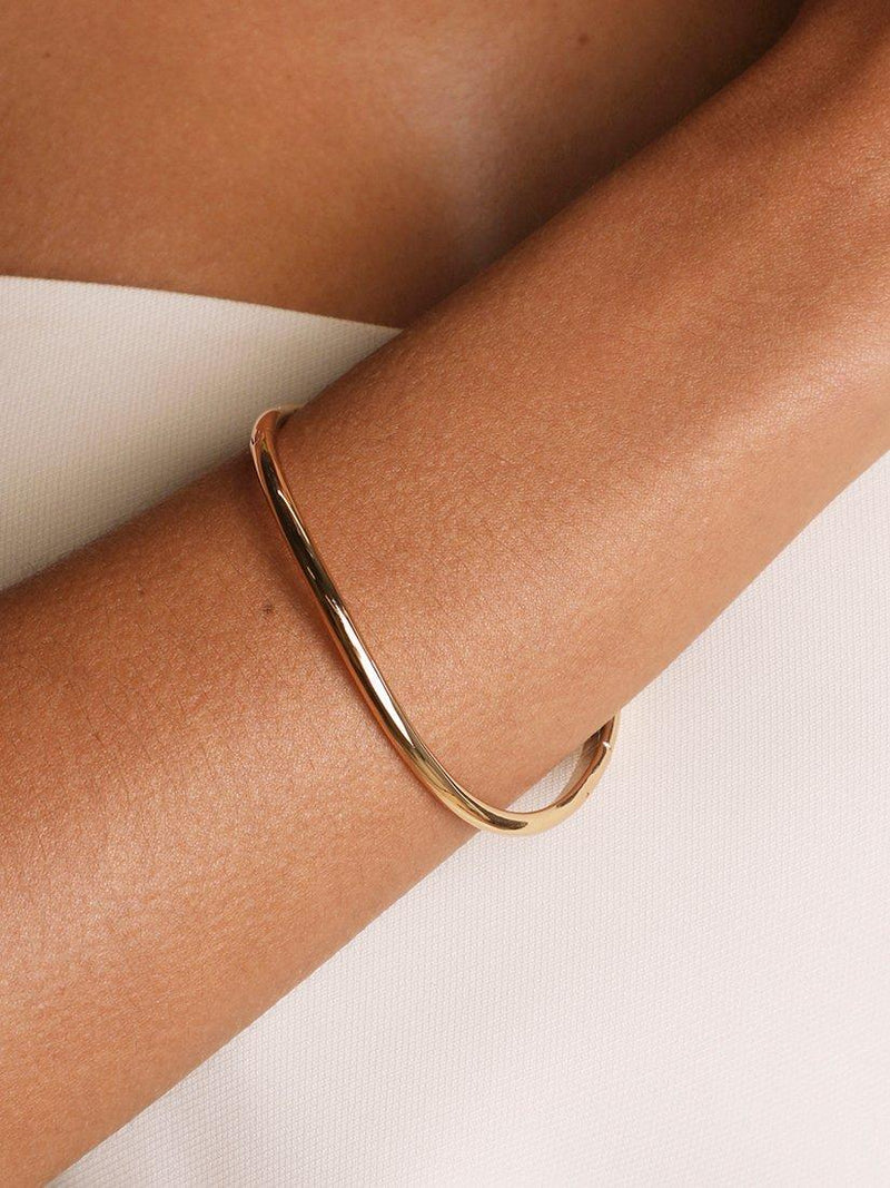 Astrid & Miyu gold wave bangle from UK - British product