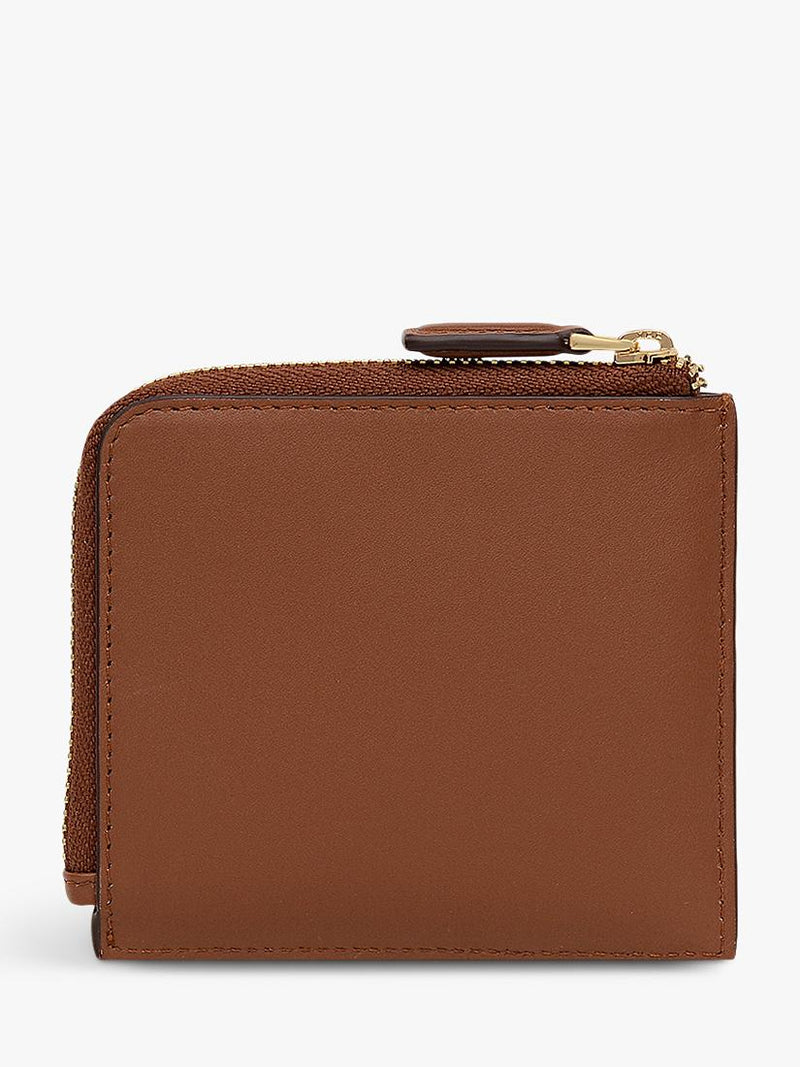 Radley floral cut-out leather purse, imported from the UK