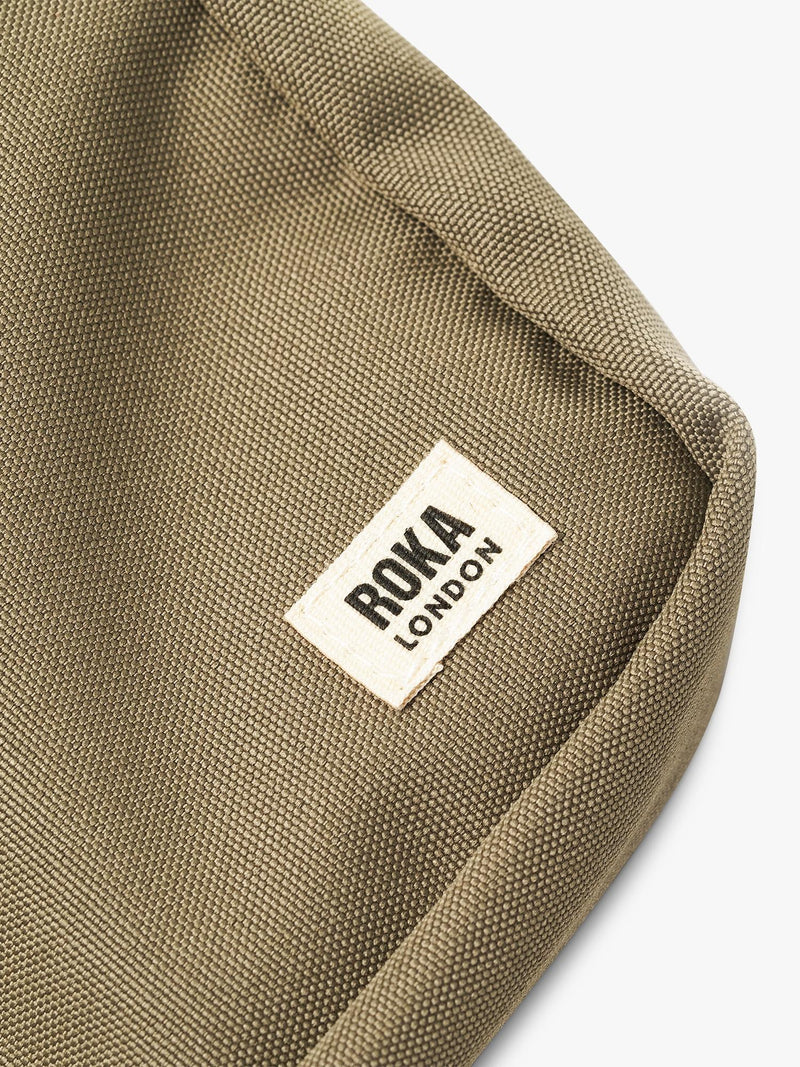 ROKA London Bond crossbody bag in green, imported from the UK