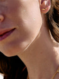 Rachel Jackson asymmetrical bird stud earrings white sapphire gold plated (British brand)