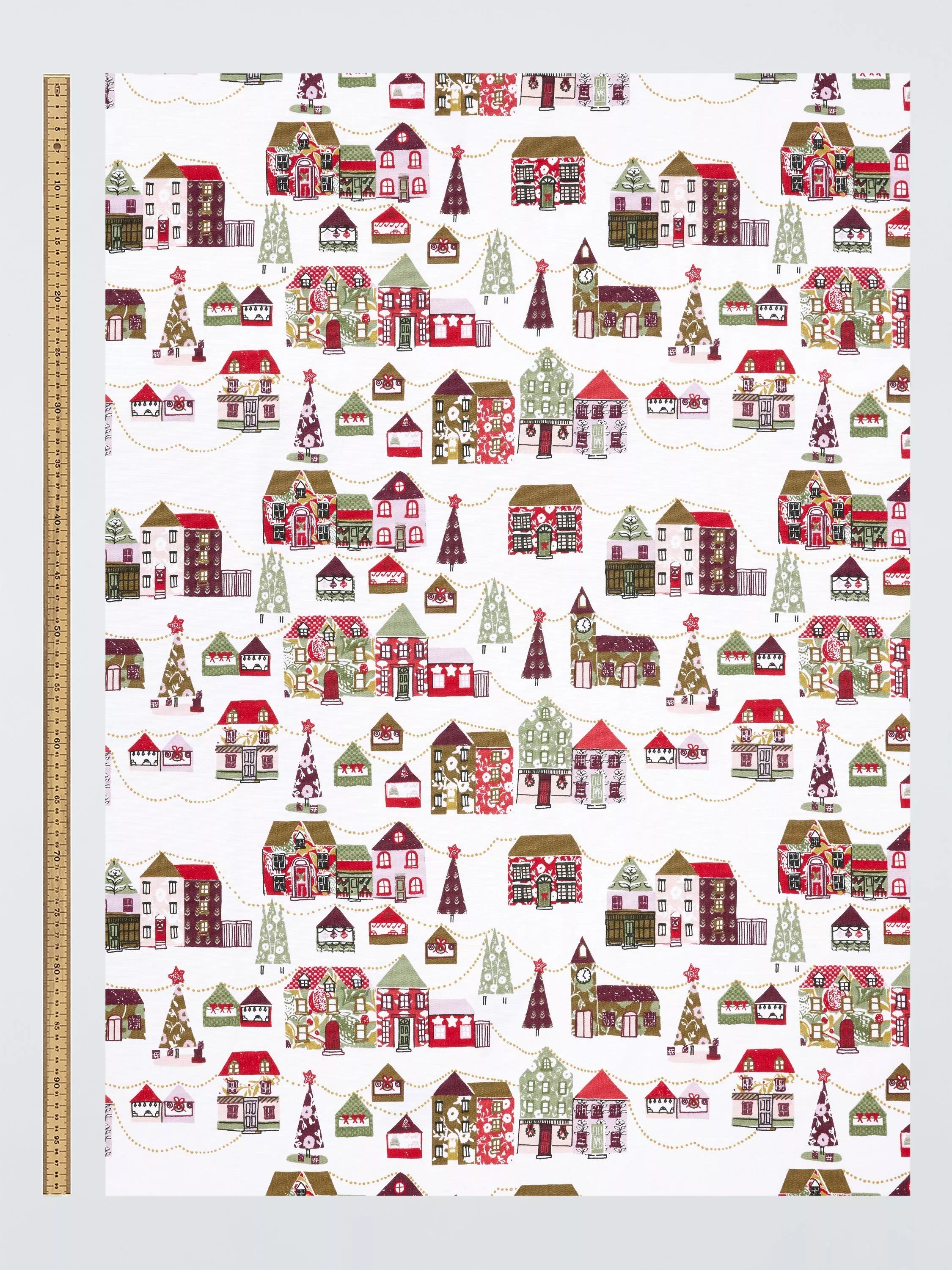 John Lewis Christmas Village oilcloth tablecloth, imported from the UK