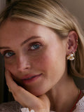 Daisy London mini knot stud earrings mixed metal (British brand)