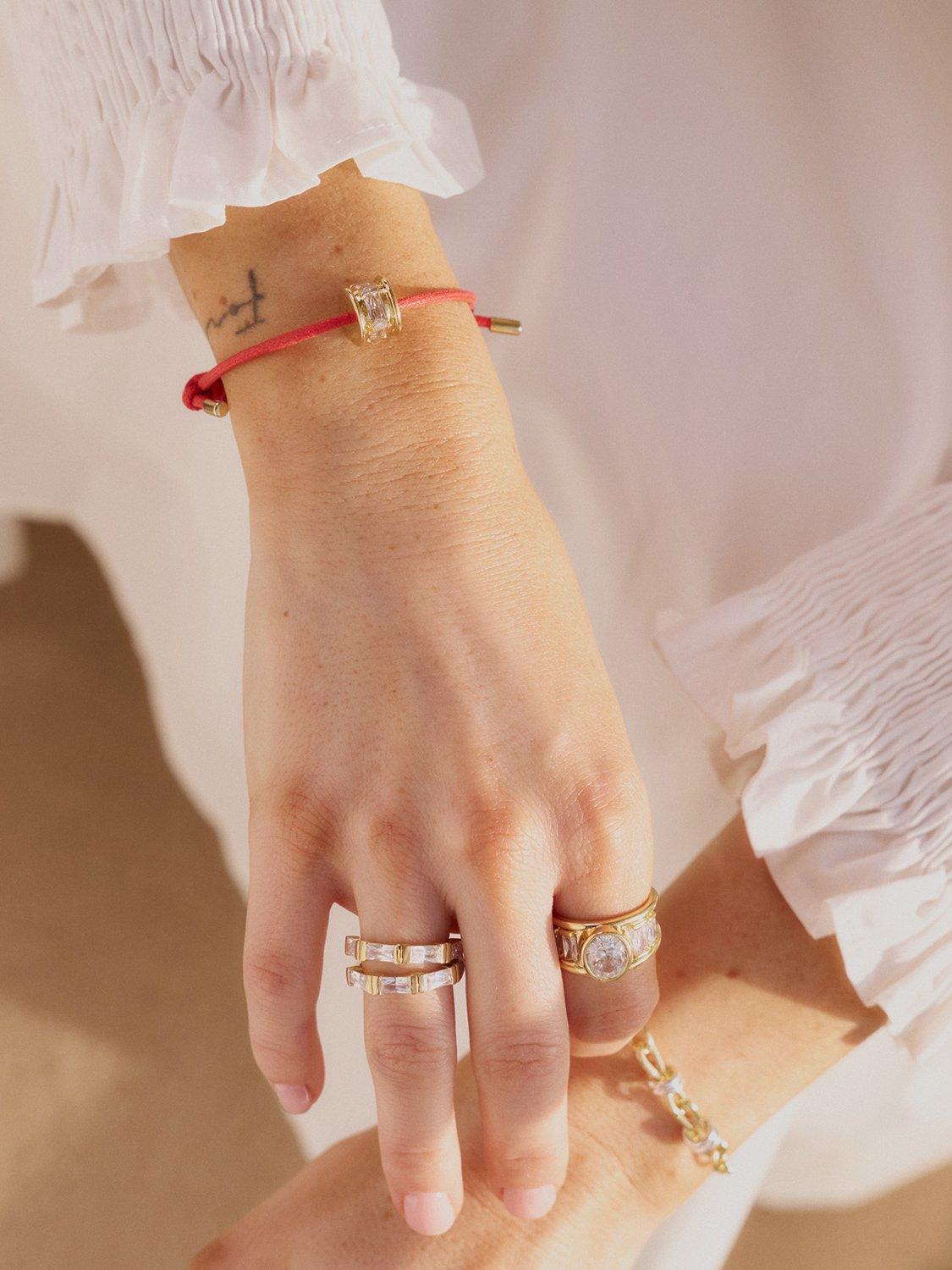 Daisy London red cord crystal bead bracelet with gold plating, imported from the UK