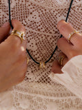 Daisy London crystal bead necklace on black cord gold, imported from the UK