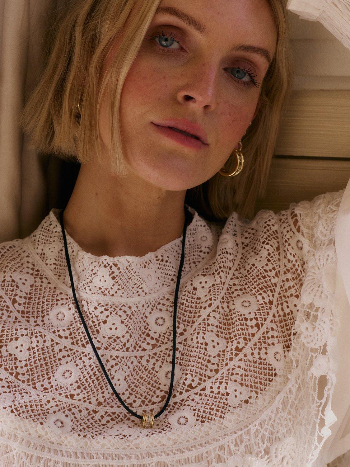 Daisy London crystal bead necklace on black cord gold, imported from the UK