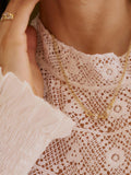 Daisy London mixed metal knot necklace, imported from the UK