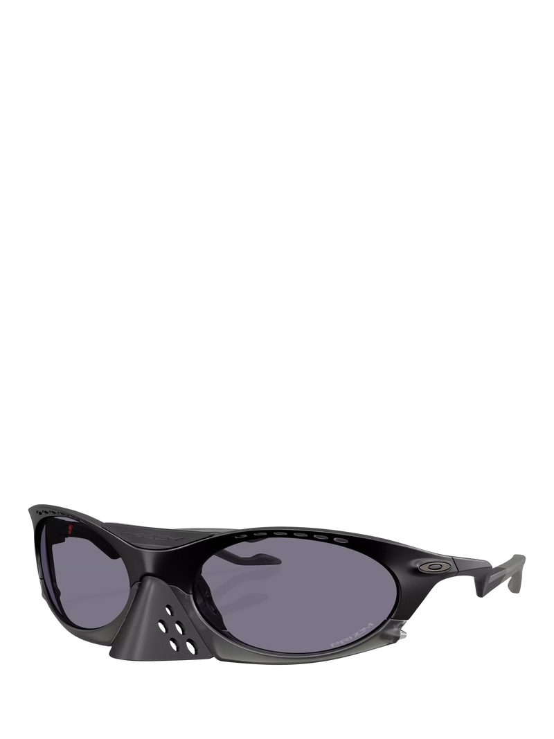 Oakley OO9437 tinted oval sunglasses, imported from the UK