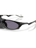Oakley OO9437 tinted oval sunglasses, imported from the UK